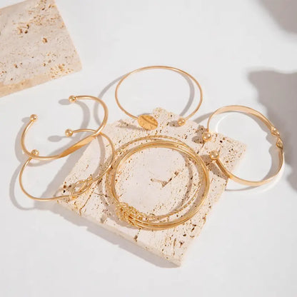 Knotted Elegance-armbandsset | Guld