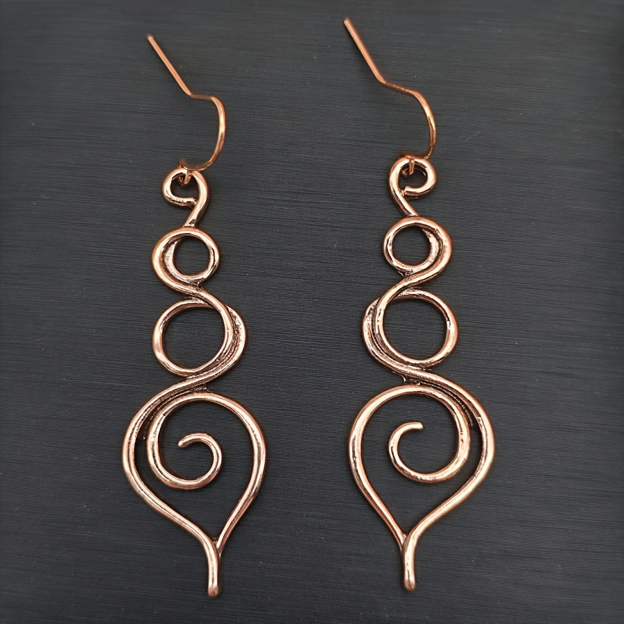 Loretta Swirl örhängen i koppar