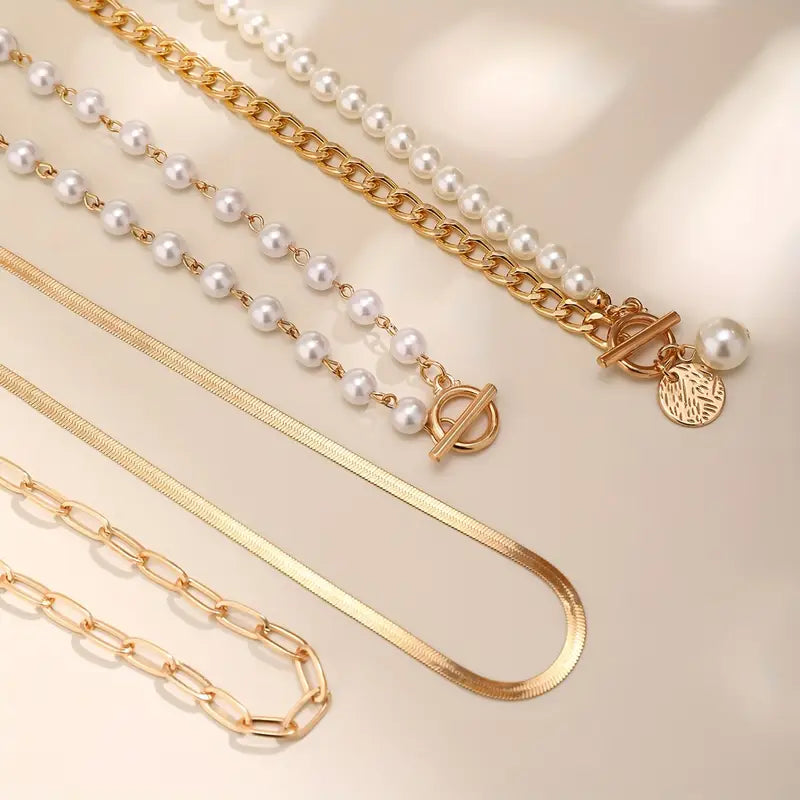Vintage halsbandsset med pärla och ormlänk i guld | Guld