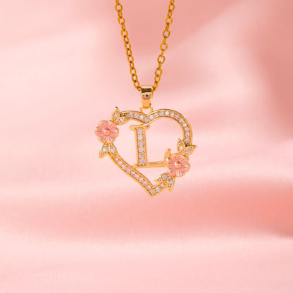 Halsband med blomberlock och initial | Guld