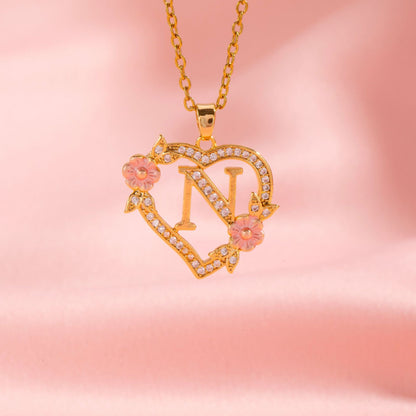 Halsband med blomberlock och initial | Guld