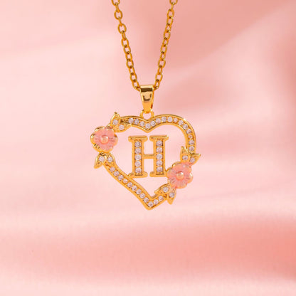 Halsband med blomberlock och initial | Guld