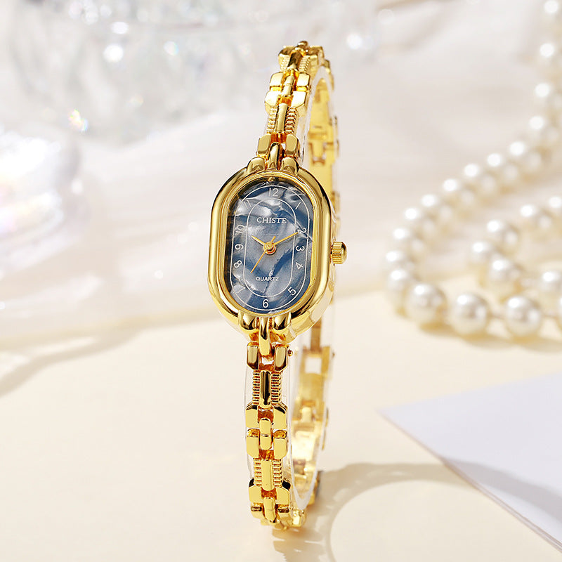 Alira Moment-klocka | Guld