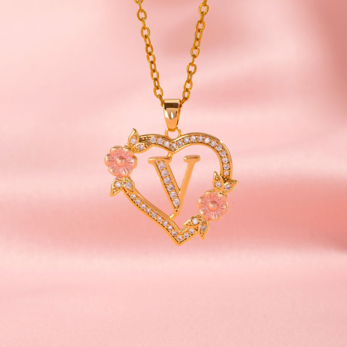Halsband med blomberlock och initial | Guld