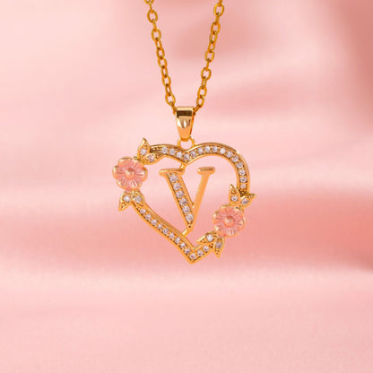 Halsband med blomberlock och initial | Guld