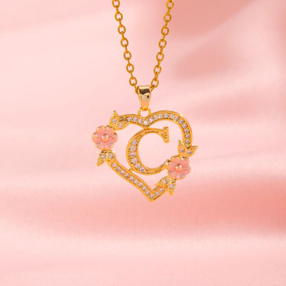 Halsband med blomberlock och initial | Guld
