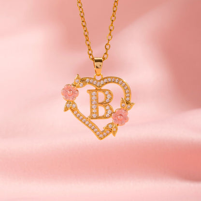 Halsband med blomberlock och initial | Guld